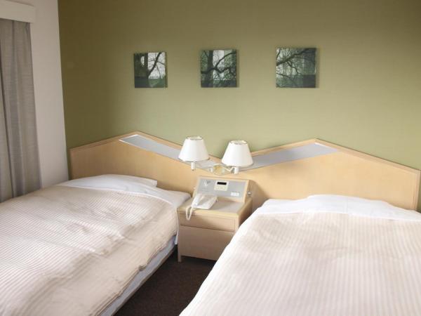 Shin Osaka Washington Hotel Plaza : photo 2 de la chambre chambre lits jumeaux standard - non-fumeurs