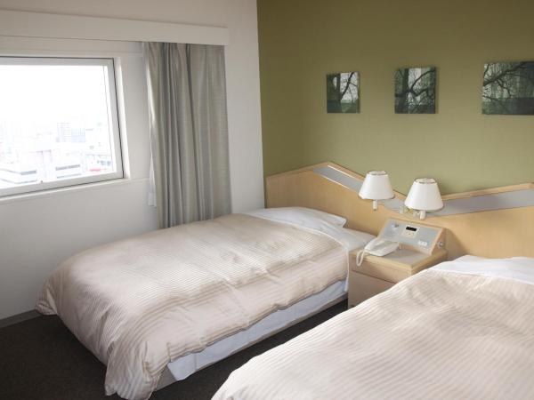 Shin Osaka Washington Hotel Plaza : photo 4 de la chambre chambre lits jumeaux standard - non-fumeurs