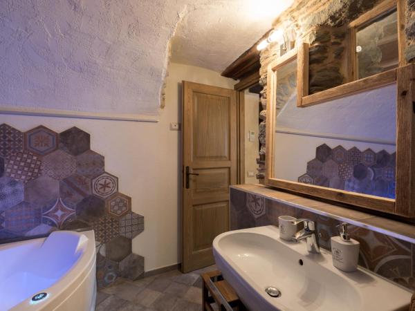 Chambres d'hôtes La Moraine Enchantée : photo 7 de la chambre chambre supérieure jacuzi