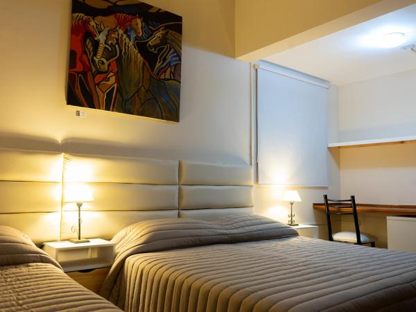 Aparthouse Mendoza : photo 2 de la chambre chambre triple