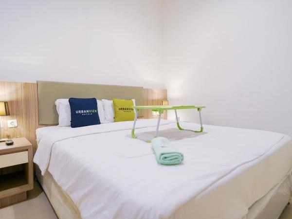 Urbanview Hotel Bes Mangga Besar by RedDoorz : photo 1 de la chambre chambre deluxe