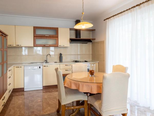 Family apartments - Guesthouse Vranješ : photo 6 de la chambre appartement avec balcon