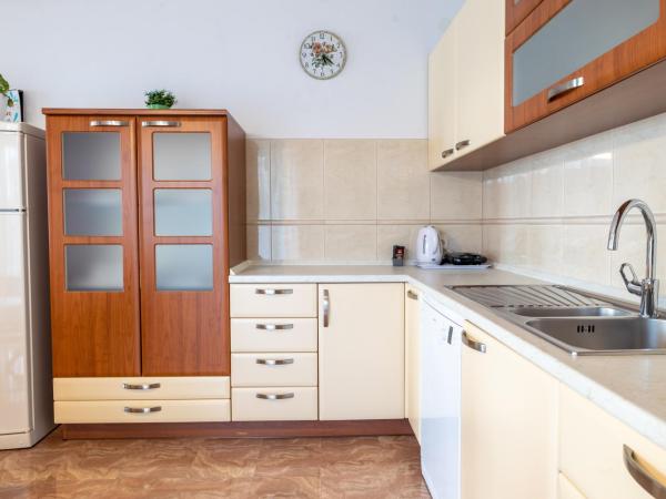 Family apartments - Guesthouse Vranješ : photo 9 de la chambre appartement avec balcon