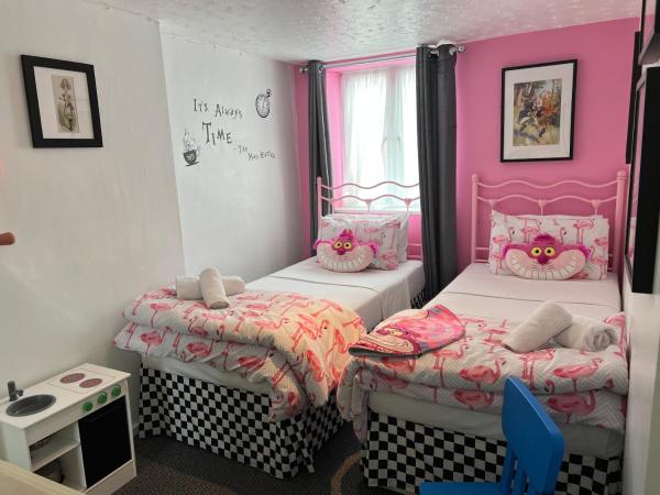 Raffles Hotel : photo 4 de la chambre chambre familiale avec salle de bains privative