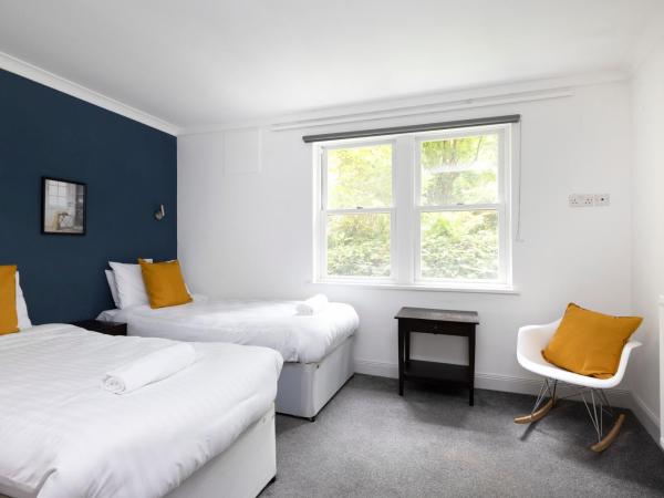 JOIVY Haymarket : photo 3 de la chambre chambre familiale avec salle de bains privative