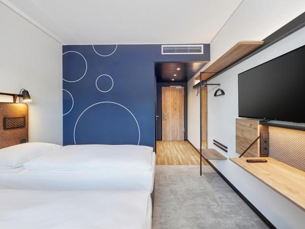 H2 Hotel Düsseldorf City : photo 5 de la chambre chambre lits jumeaux standard