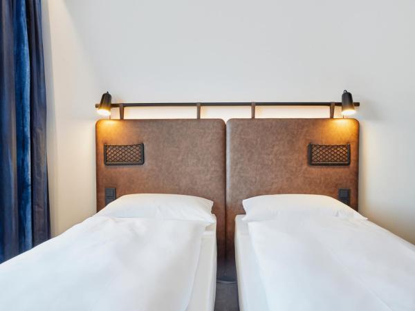 H2 Hotel Düsseldorf City : photo 4 de la chambre chambre lits jumeaux standard