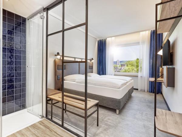 H2 Hotel Düsseldorf City : photo 1 de la chambre chambre double standard