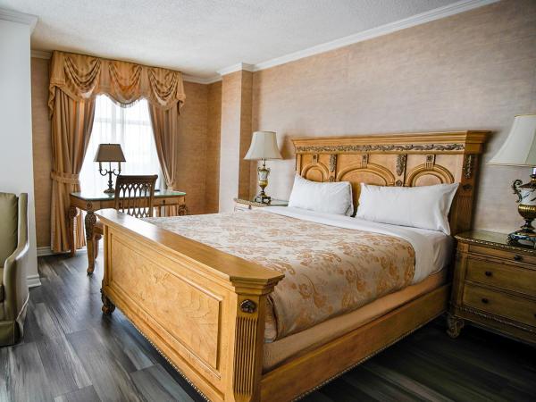 Hôtel Palace Royal : photo 1 de la chambre chambre signature avec 1 lit queen-size et canapé-lit