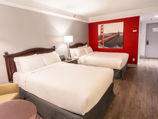 Hôtel Québec Inn : photo 4 de la chambre chambre traditionnelle avec 2 lits doubles et terrasse intérieure - côté piscine
