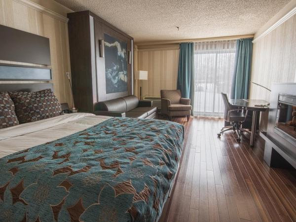 Hôtel Québec Inn : photo 2 de la chambre chambre moderne avec lit queen-size, lit queen-size escamotable et cheminée - vue sur extérieur
