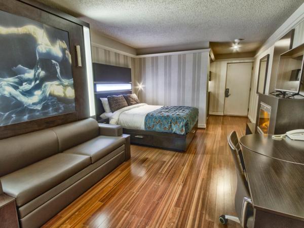 Hôtel Québec Inn : photo 1 de la chambre chambre moderne avec lit queen-size, lit queen-size escamotable et cheminée - vue sur intérieur