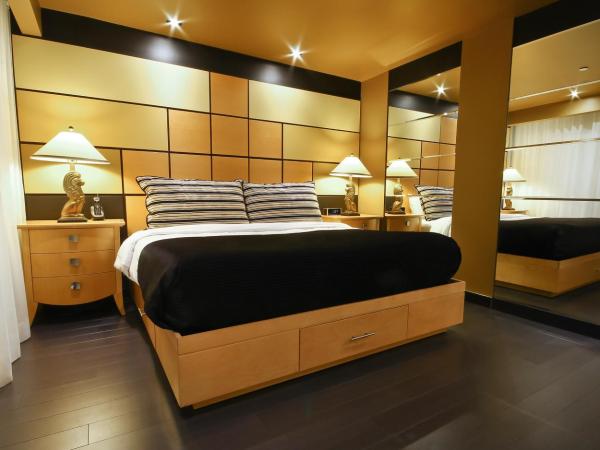 Hôtel Québec Inn : photo 1 de la chambre suite lit king-size avec canapé-lit - thème art déco