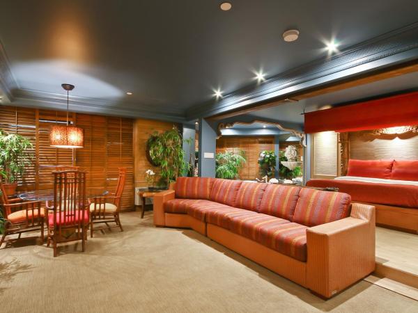 Hôtel Québec Inn : photo 4 de la chambre suite lit king-size avec canapé-lit - thème polynésien