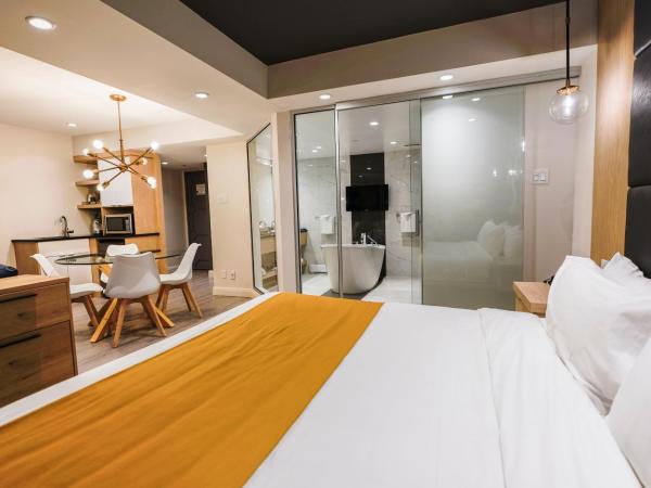 Hôtel Québec Inn : photo 4 de la chambre suite lit queen-size - thème asiatique