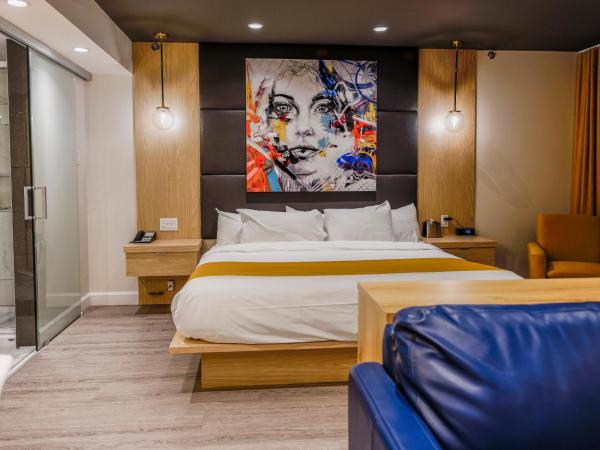 Hôtel Québec Inn : photo 3 de la chambre suite lit queen-size - thème asiatique