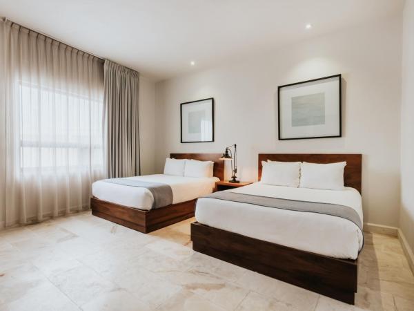 The Strabon Tulum : photo 3 de la chambre chambre avec 2 grands lits queen-size 