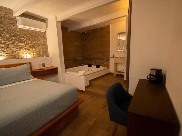 El Jardín de la Abuela : photo 4 de la chambre chambre lit king-size avec baignoire spa