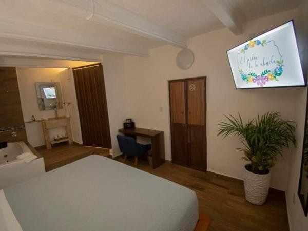 El Jardín de la Abuela : photo 5 de la chambre chambre lit king-size avec baignoire spa