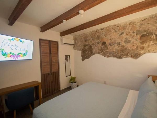 El Jardín de la Abuela : photo 8 de la chambre chambre lit king-size