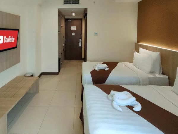 Vasaka Hotel Jakarta Managed by Dafam : photo 9 de la chambre chambre lits jumeaux deluxe