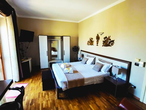 Attico Barocco : photo 10 de la chambre chambre lit king-size supérieure avec balcon