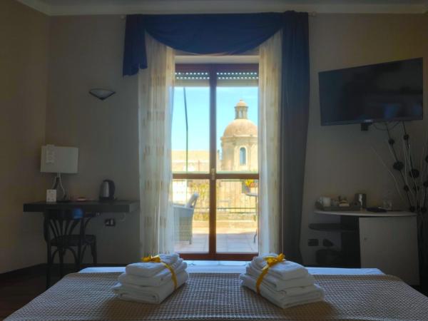 Attico Barocco : photo 3 de la chambre chambre lit king-size supérieure avec balcon