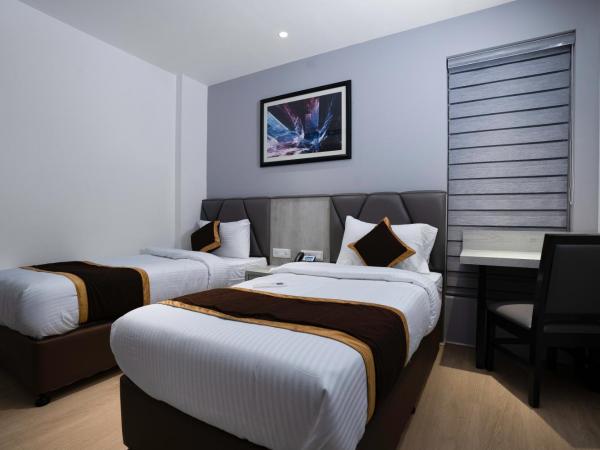 Poiisse : photo 4 de la chambre chambre lits jumeaux deluxe