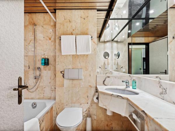 becozy Au Parc Retro Edition Self-Check-In Rooms & Studios Fribourg : photo 2 de la chambre chambre simple