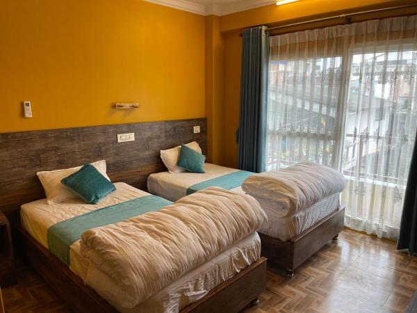 Munus Travel Home : photo 2 de la chambre chambre lits jumeaux deluxe