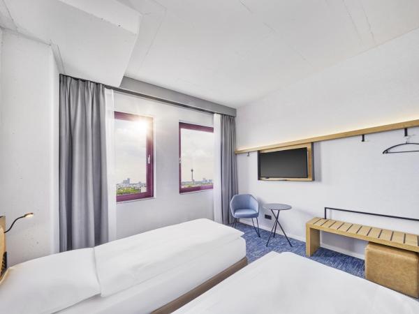 H2 Hotel Düsseldorf Seestern : photo 2 de la chambre chambre lits jumeaux confort