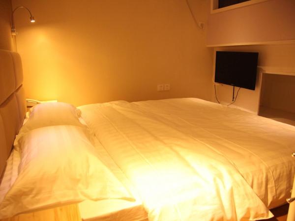 Shanghai Fish Inn East Nanjing Road : photo 6 de la chambre suite lit queen-size deluxe