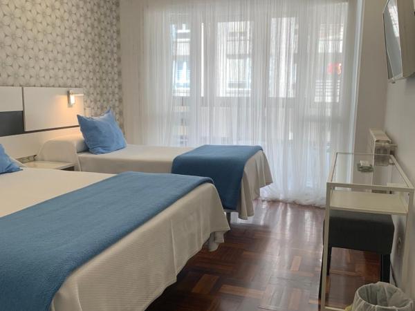 Hostal San Fernando : photo 7 de la chambre chambre triple avec terrasse