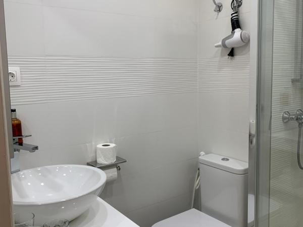 Hostal San Fernando : photo 4 de la chambre chambre triple avec terrasse