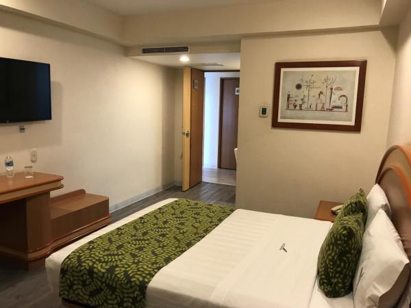 Hotel Aeropuerto : photo 8 de la chambre chambre deluxe (2 adultes + 1 enfant)