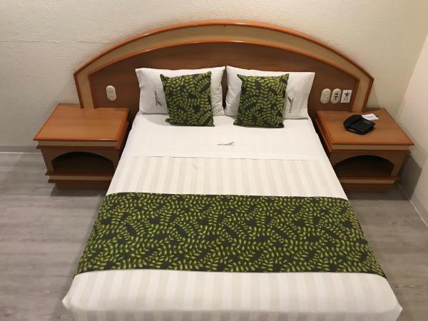 Hotel Aeropuerto : photo 7 de la chambre chambre deluxe (2 adultes + 1 enfant)