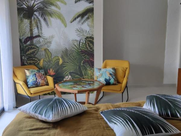 Chambre d'hôtes Les terrasses de Saint Clair : photo 1 de la chambre suite familiale