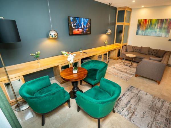 The Gate 30 Suites Ataşehir : photo 5 de la chambre suite - vue sur jardin