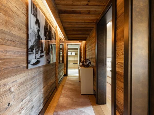 Ultima Gstaad : photo 2 de la chambre suite pearl avec 2 grandes chambres et 1 salle de bains