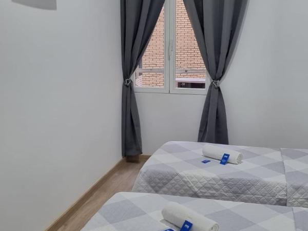 Hostal Vara Madrid : photo 4 de la chambre chambre lits jumeaux