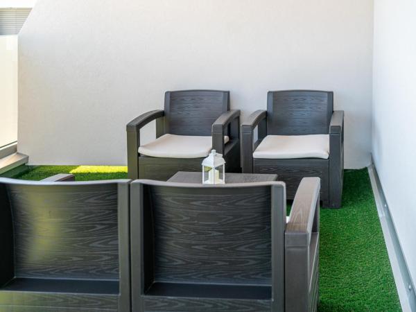 Hotel Alexander : photo 5 de la chambre chambre familiale - vue sur mer