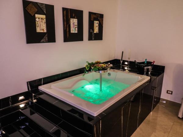 Ventidue Venti : photo 7 de la chambre chambre lit queen-size avec baignoire spa