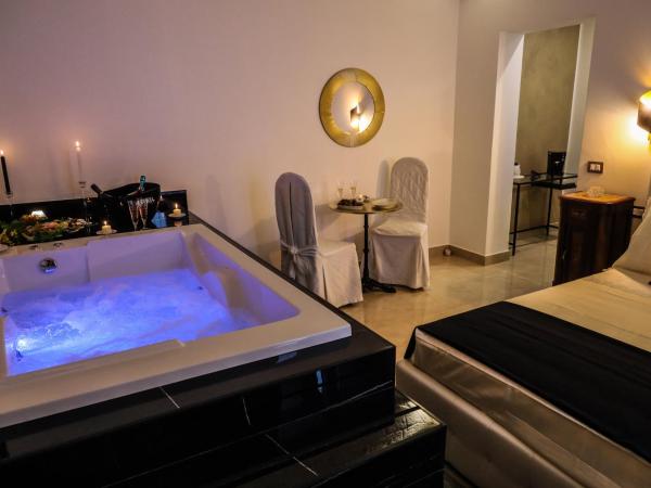 Ventidue Venti : photo 8 de la chambre chambre lit queen-size avec baignoire spa