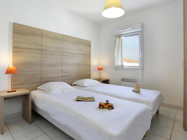 Vacancéole - Résidence Cap Camargue : photo 10 de la chambre appartement duplex (6 adultes)
