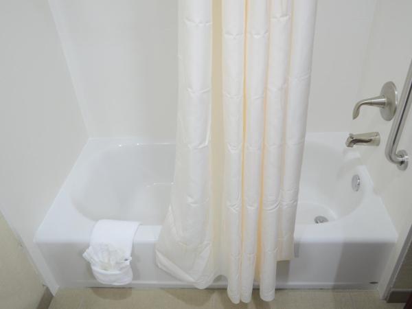Comfort Suites Northwest - Cy - Fair : photo 5 de la chambre suite lit king-size avec canapé-lit