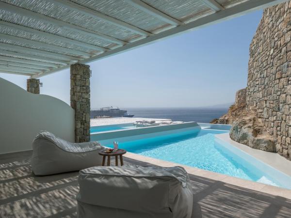 Arocaria Mykonos : photo 4 de la chambre suite lit queen-size