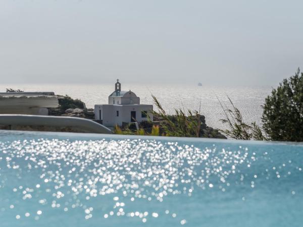 Arocaria Mykonos : photo 4 de la chambre suite lit king-size - vue sur mer