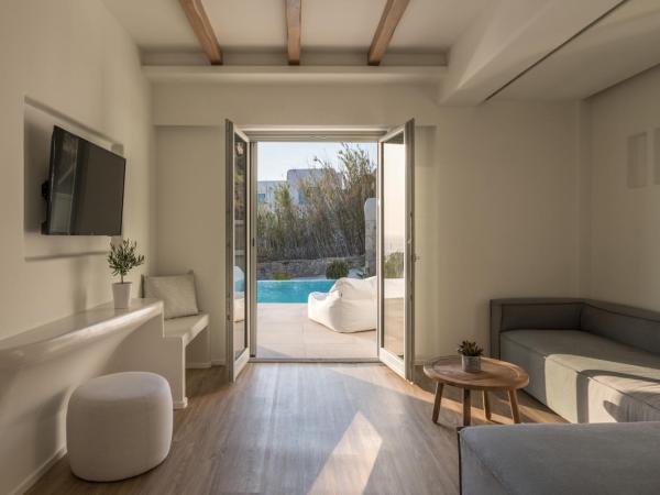 Arocaria Mykonos : photo 2 de la chambre suite lit king-size - vue sur mer