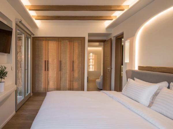Arocaria Mykonos : photo 5 de la chambre suite lit king-size - vue sur mer