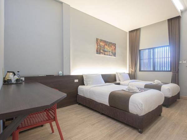 Tarnsiri Boutique Resort : photo 6 de la chambre chambre lits jumeaux deluxe